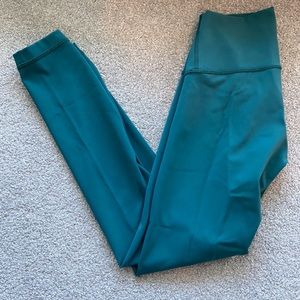 Lululemon Wonder Under in turquoise green